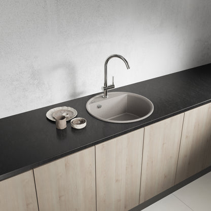 Laveo Muna round single-bowl sink - angled kitchen lifestyle showing the beige finish