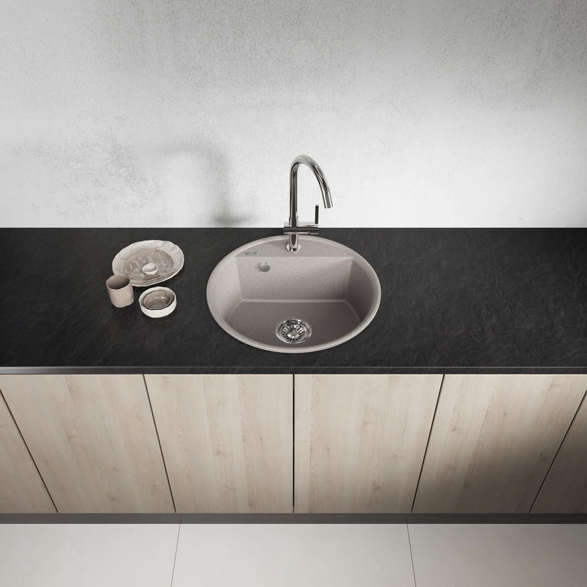 Laveo Muna round single-bowl sink - front kitchen lifestyle showing the beige finish