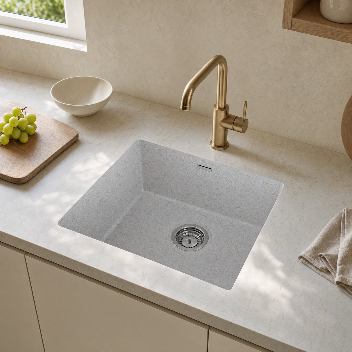 Sternhagen Enigma N100M Bianca undermount single bowl granite composite kitchen sink in a modern kitchen