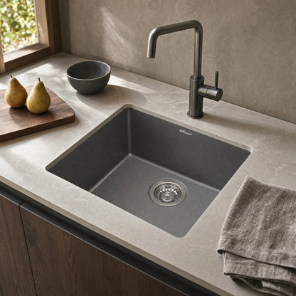 Sternhagen Enigma N100M Metallic Grey undermount single bowl granite composite kitchen sink in a modern kitchen